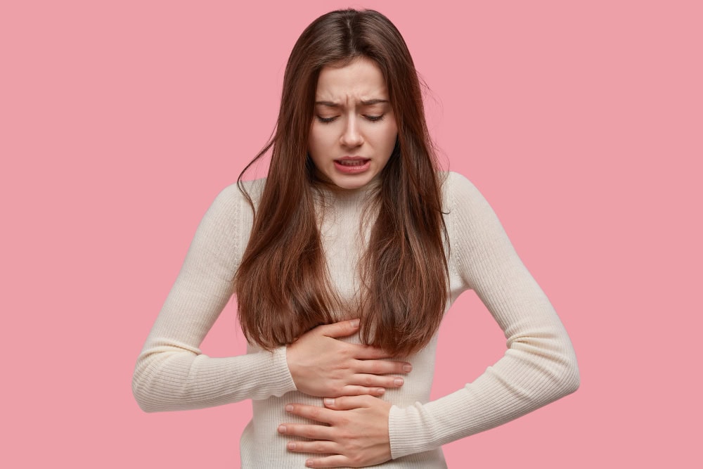 image unhappy woman suffers from stomachache after eating spoiled food feels discomfort belly has disorder image unhappy woman suffers from stomachache after eating spoiled food feels discomfort belly has disorder