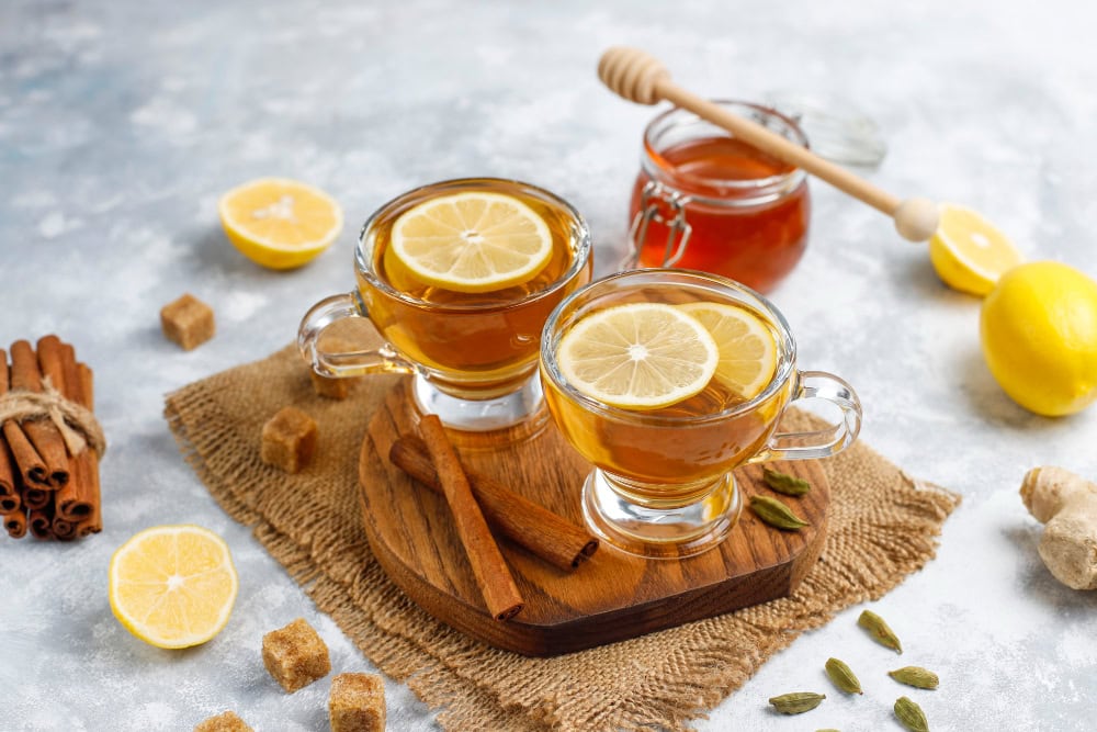 cup tea brown sugar honey lemon concrete top view copy space
