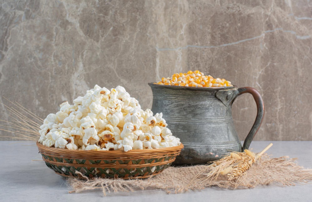 jug corn grains single wheat stalk weaved basket popcorn piece cloth marble surface Patlamış Mısır