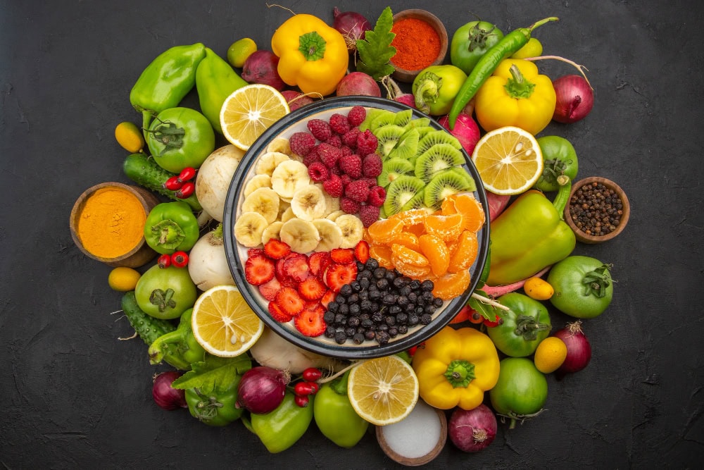 top view delicious fruit salad inside plate with fresh fruits dark tropical fruit tree exotic ripe diet photo Sağlık